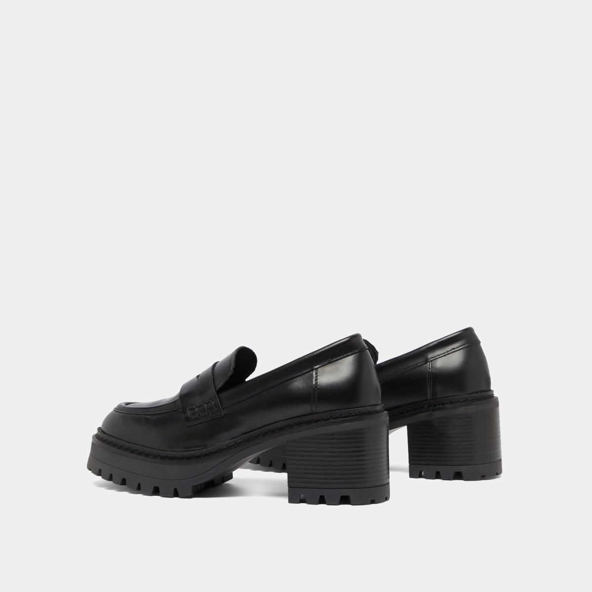 Heeled loafers with notched soles in black shiny leather | RHUM