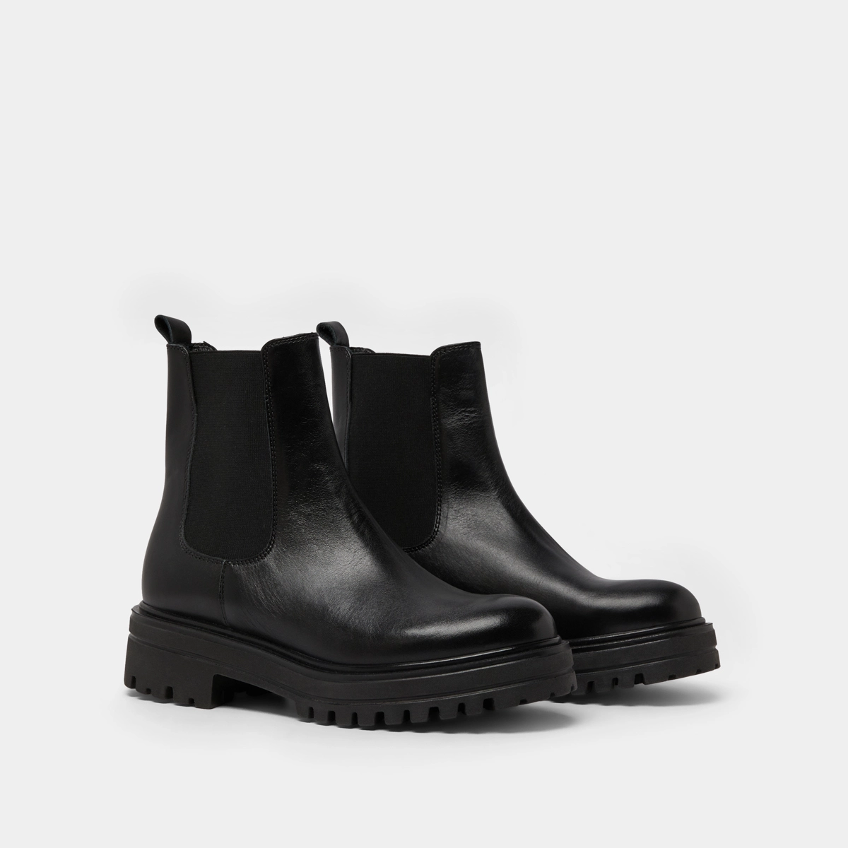 Boots with notched and elastic soles in black leather | AMANDINE