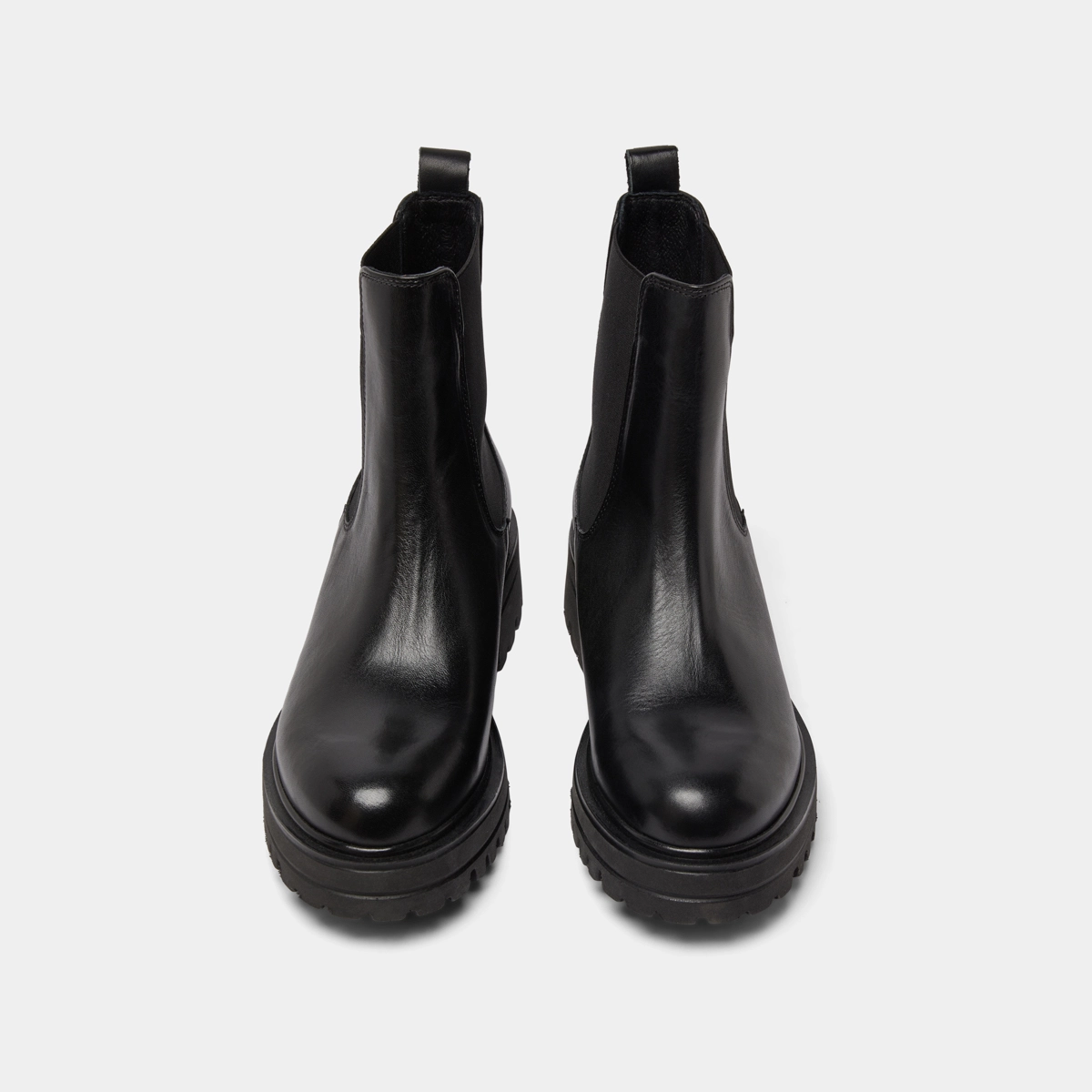 Boots with notched and elastic soles in black leather | AMANDINE