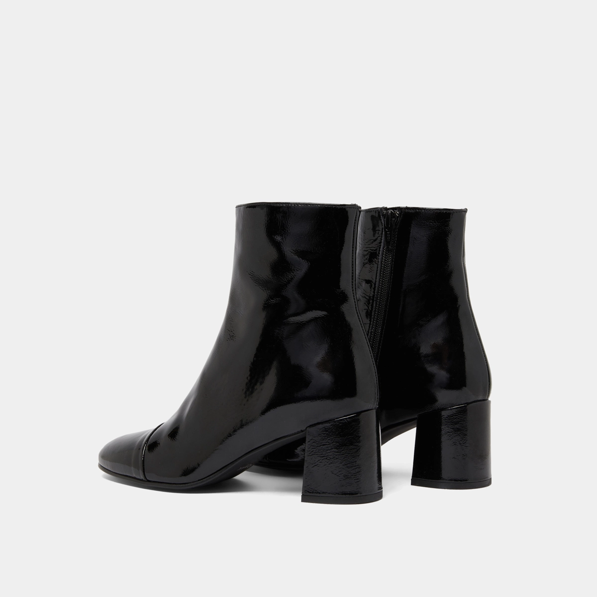 Heeled boots in black pleated patent | DONIAMA