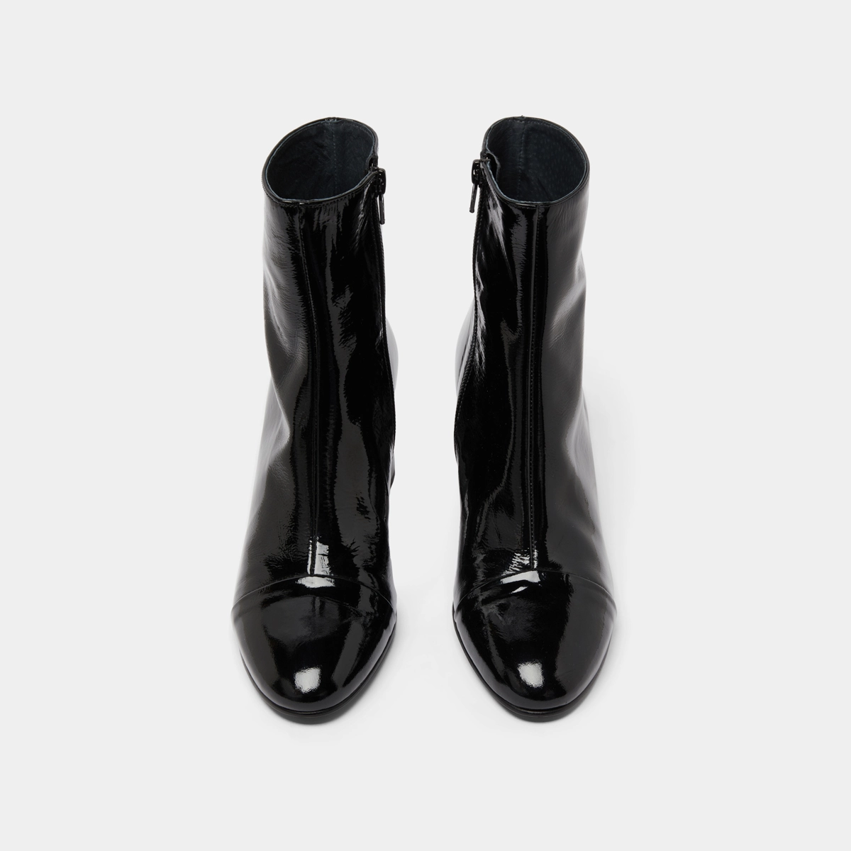 Heeled boots in black pleated patent | DONIAMA