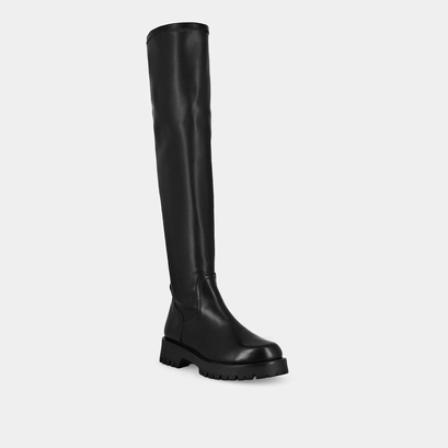 Boots with notched soles in black leather | radar
