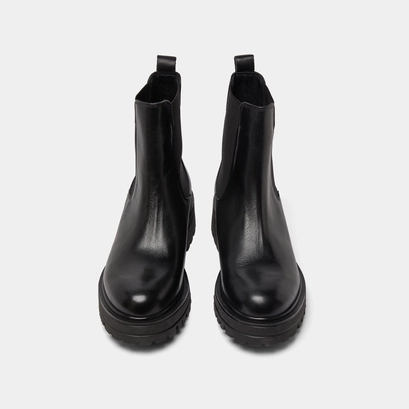 Boots with notched and elastic soles in black leather | amandine