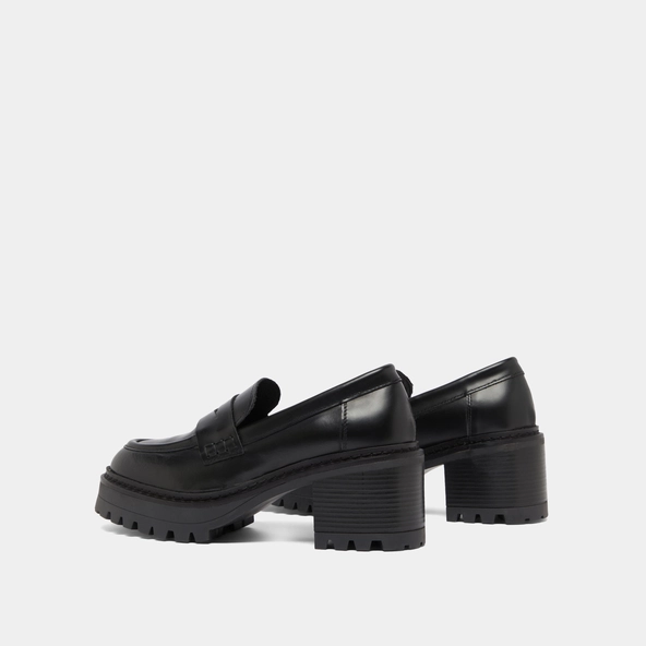 Heeled loafers with notched soles in black shiny leather | RHUM