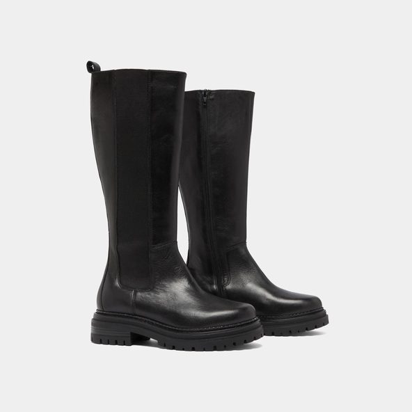 Boots with round toes and notched soles in black leather | ADAL