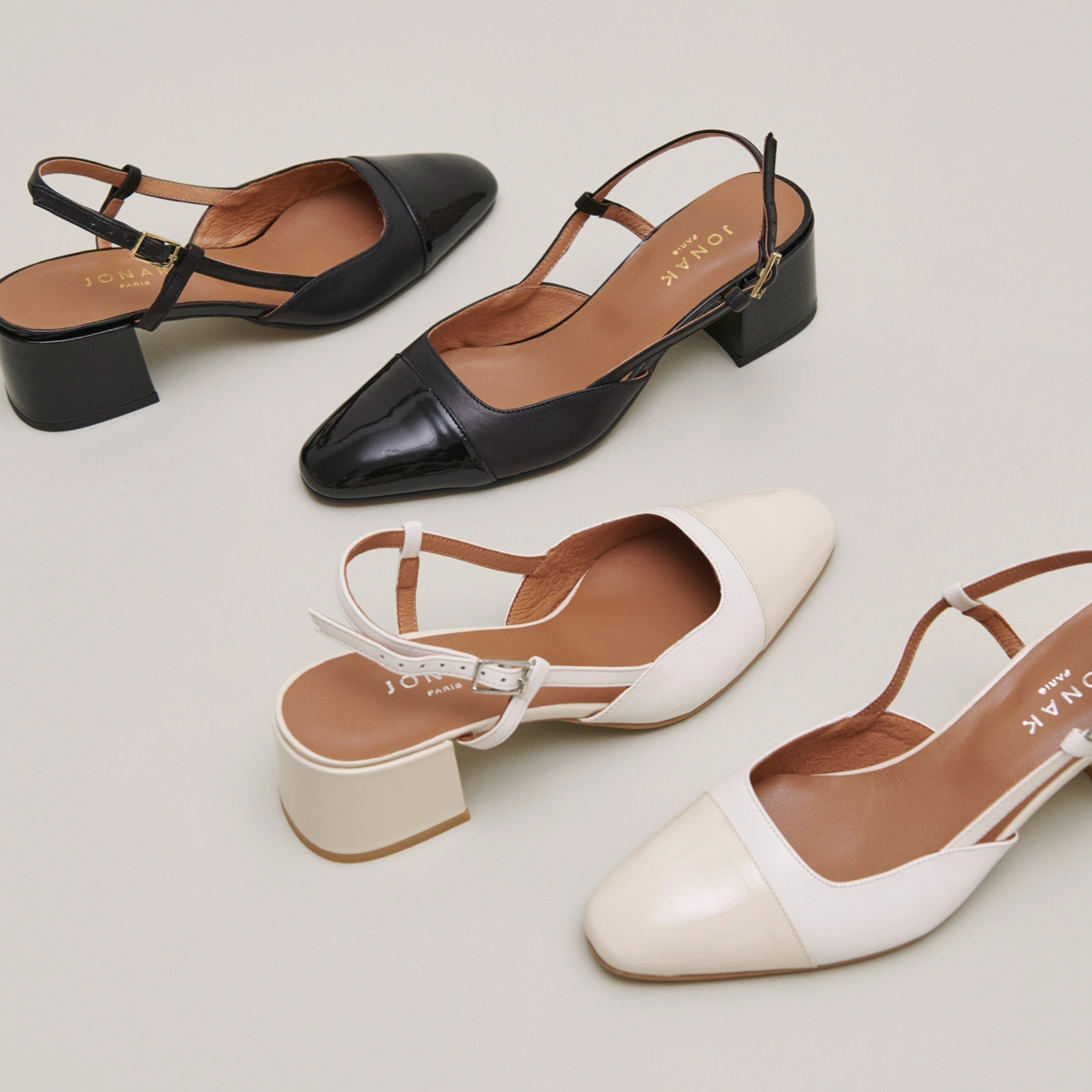Babies with open heels in ecru leather and patent | DHAPOPY