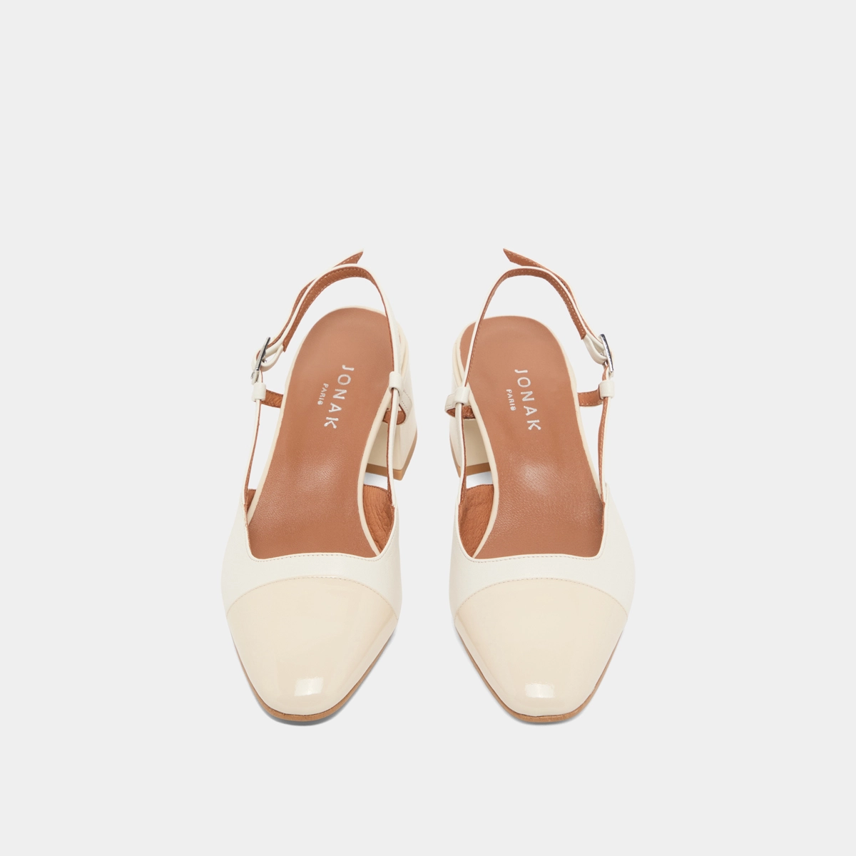 Babies with open heels in ecru leather and patent | DHAPOPY