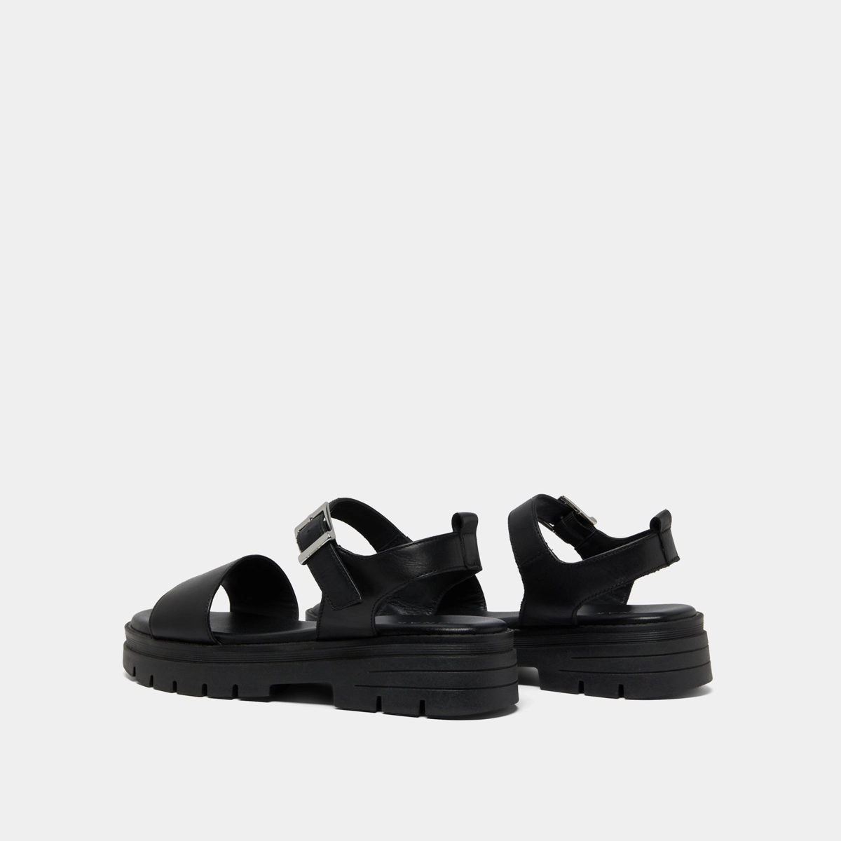 Platform sandals with straps in black leather | ASK