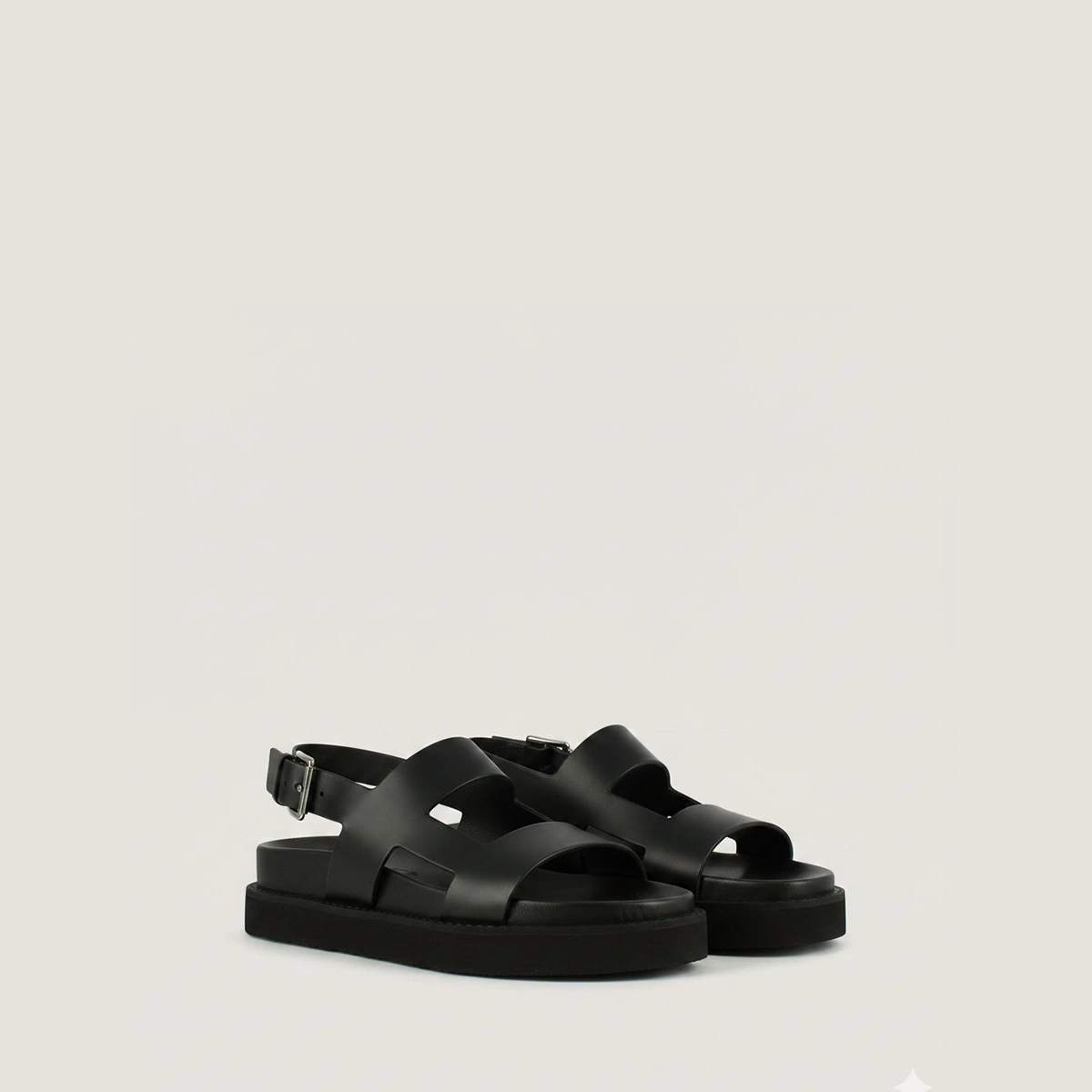 Cross-strap sandals in black shiny leather | LAGUNE
