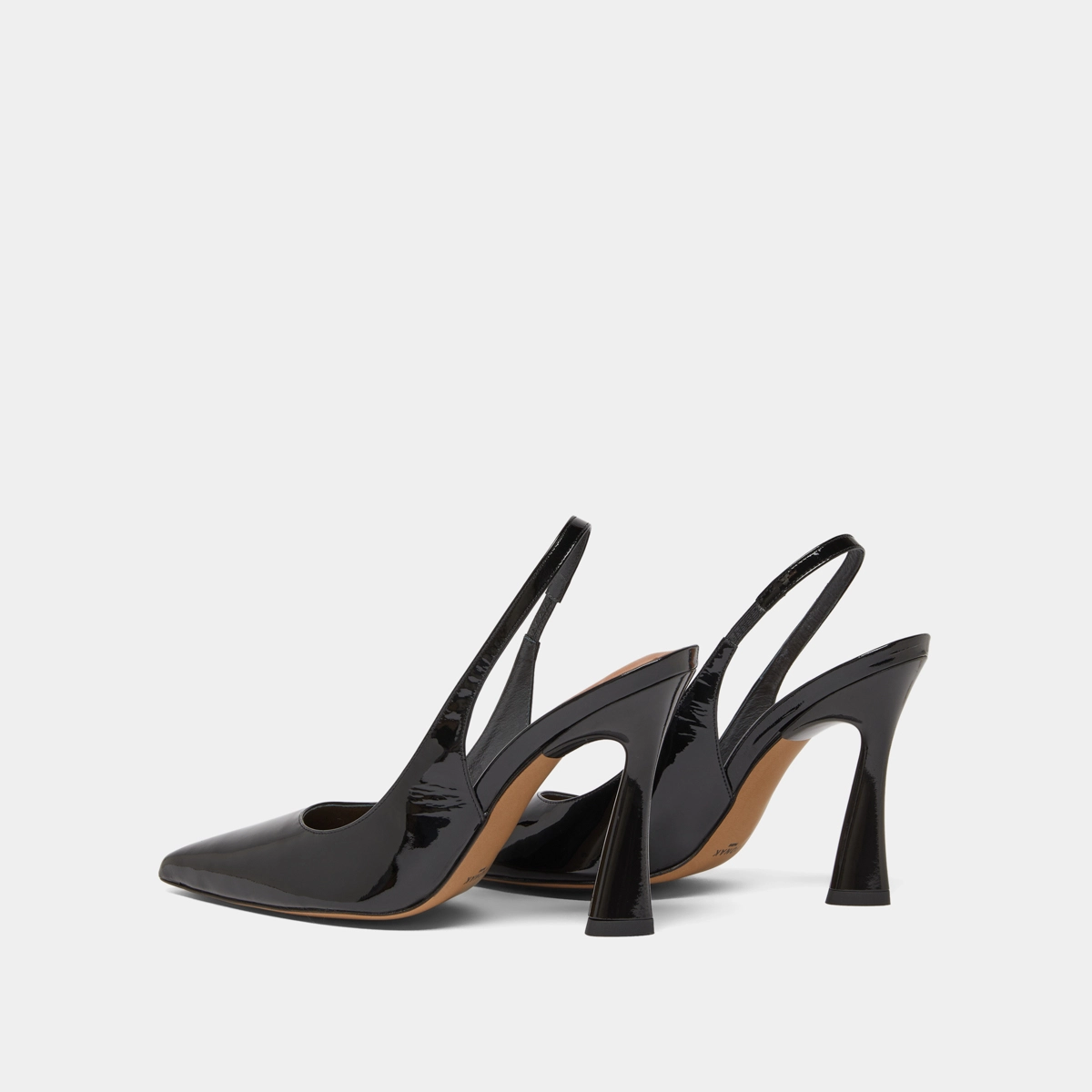 Pointed toe slingback pumps in black patent | DRESSY