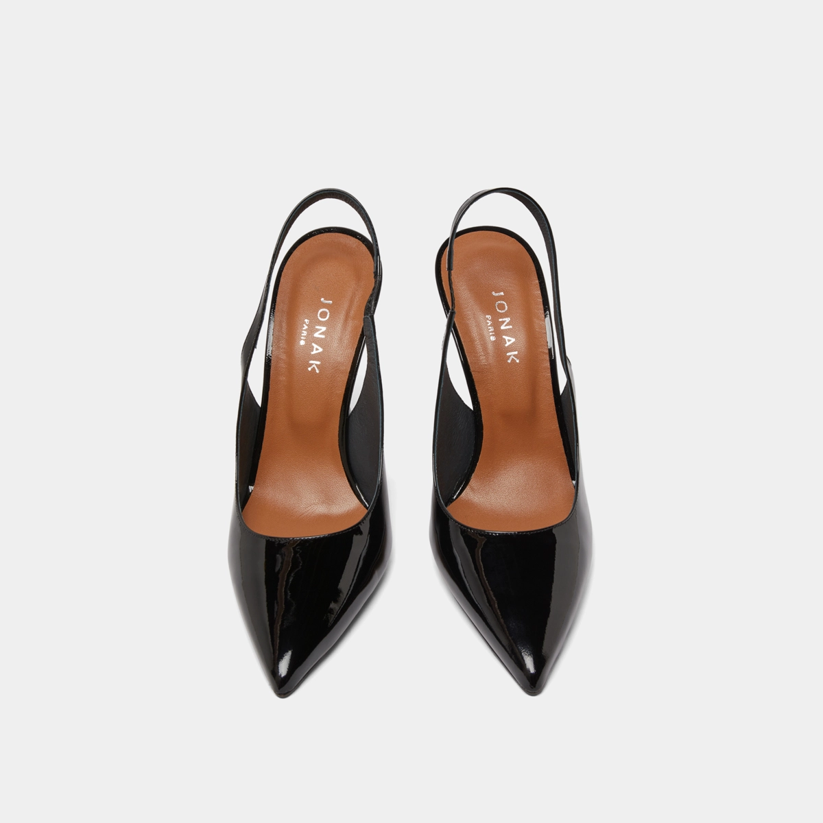 Pointed toe slingback pumps in black patent | DRESSY