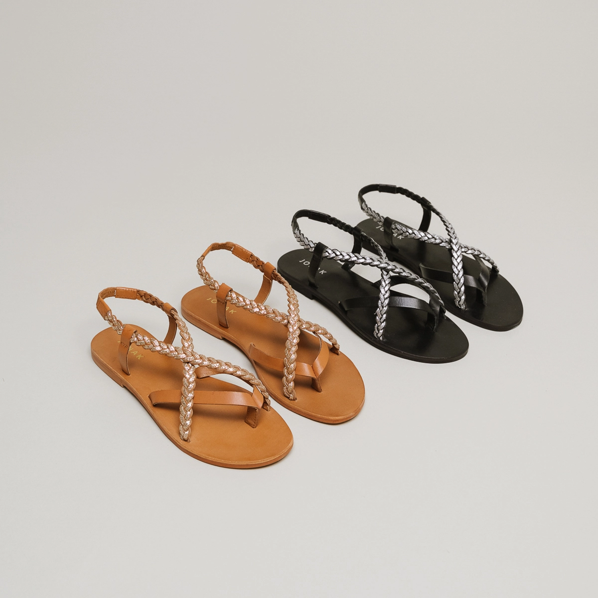 Sandals with braided straps in black and silver leather | WARREN