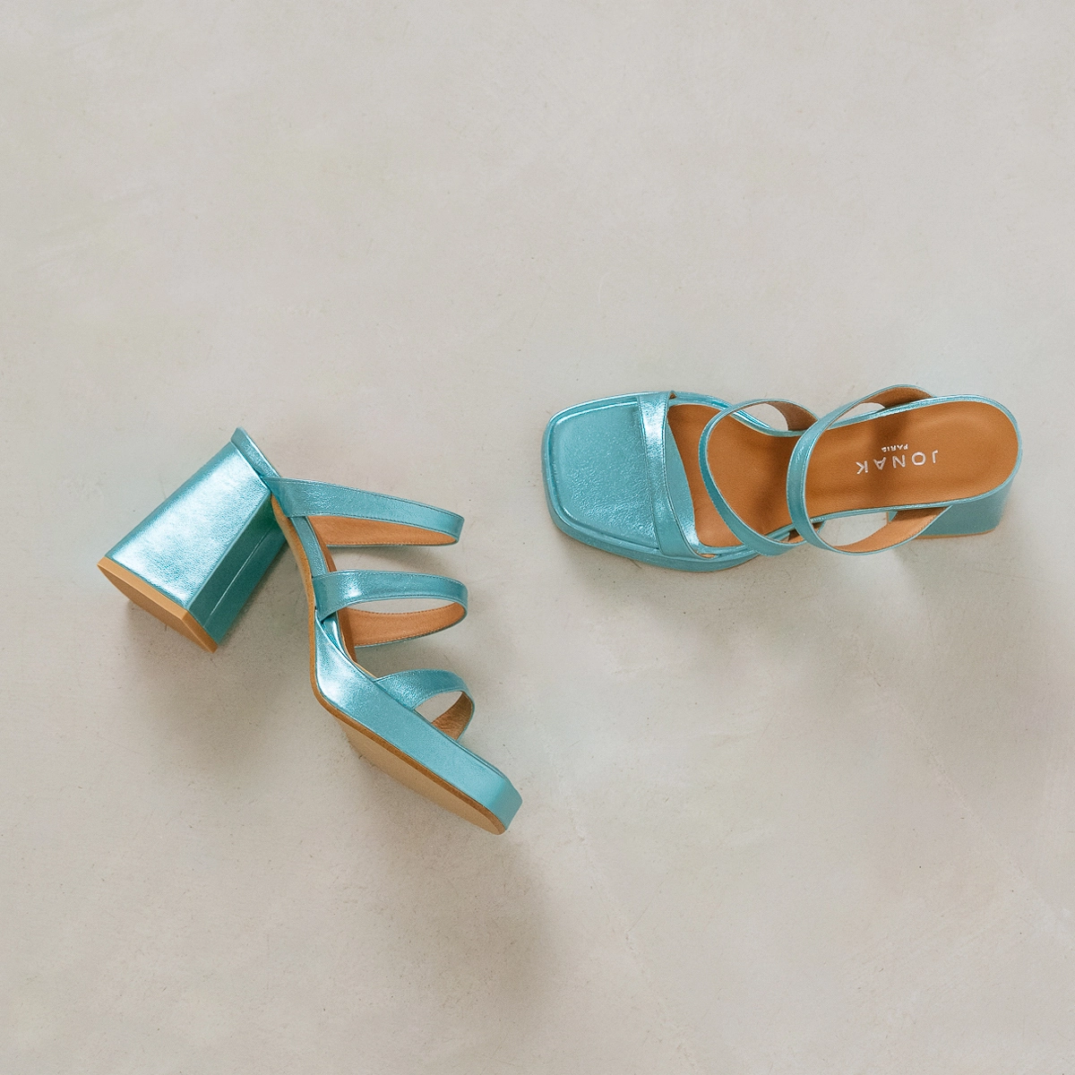 Mules with straps and square toes in turquoise metallic leather | DONZELLE