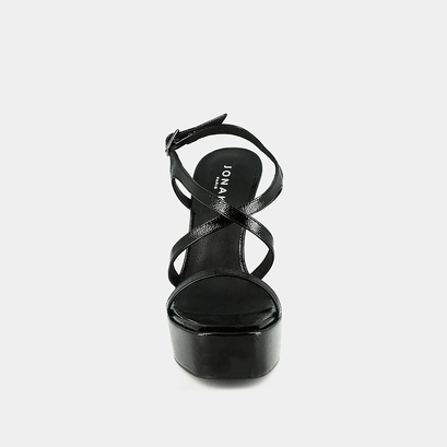 Platform sandals with crossed straps in black pleated leather | boecia