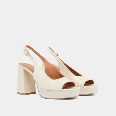 Square toe pumps with high heels in ecru aged leather | vlad