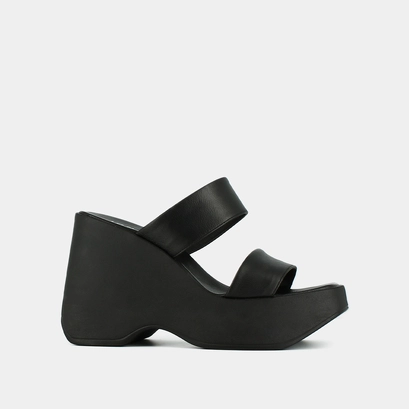Wedge mules with straps in black leather | priscilla