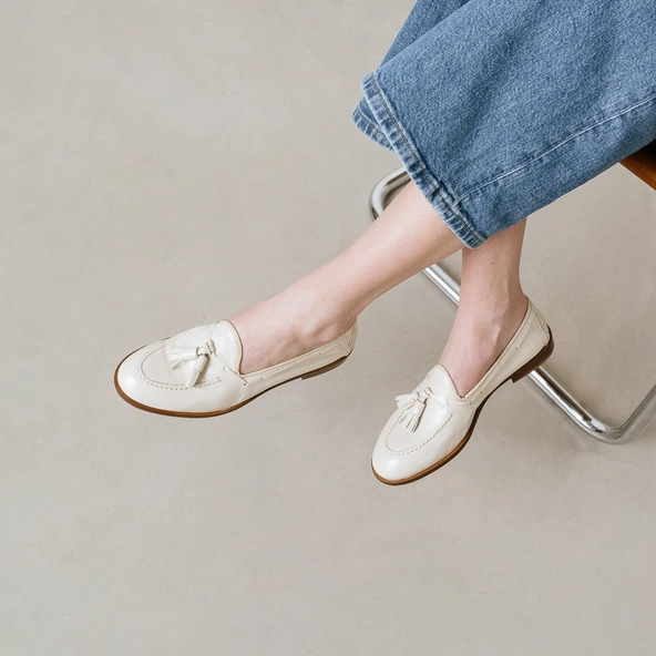 Round toe loafers with pompons in pleated patent ecru | TIPHAINE