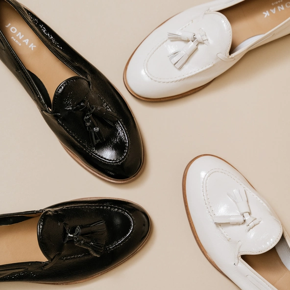 Round toe loafers with pompons in pleated patent ecru | TIPHAINE
