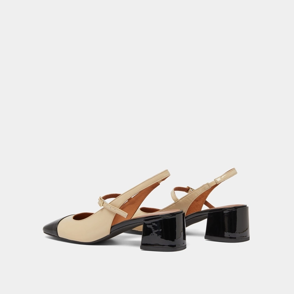 Heeled Mary Janes in black and ecru patent | DOUMY