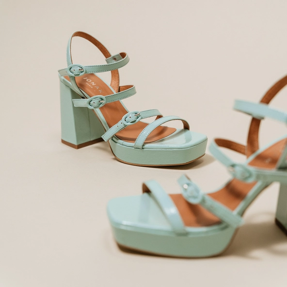 Sandals with straps and square toes in turquoise pleated leather | VALENS