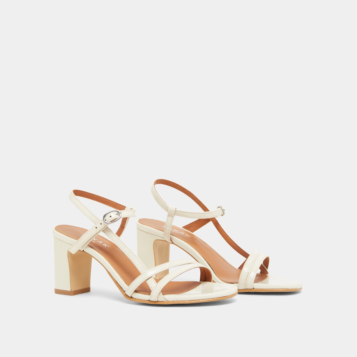 Sandals with heels and straps in ecru shiny leather | VICOMTE