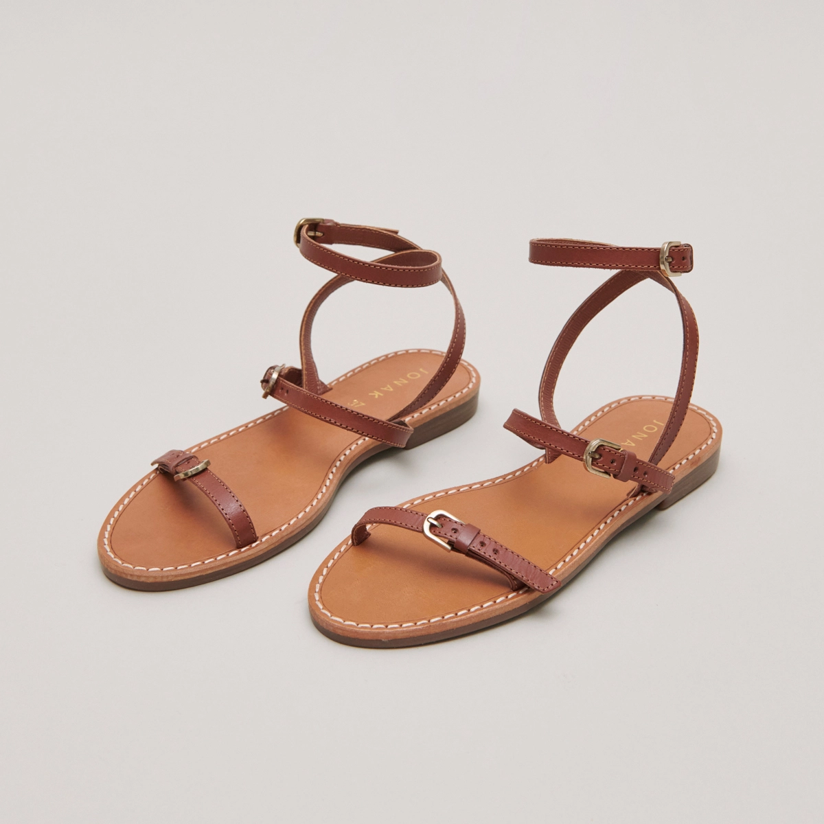 Straps sandals in cognac leather | WINDSOR