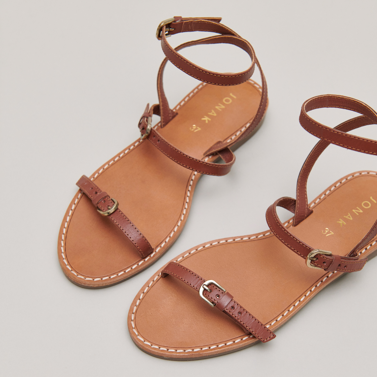 Straps sandals in cognac leather | WINDSOR