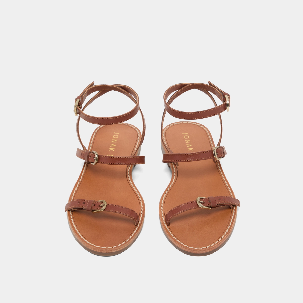 Straps sandals in cognac leather | WINDSOR