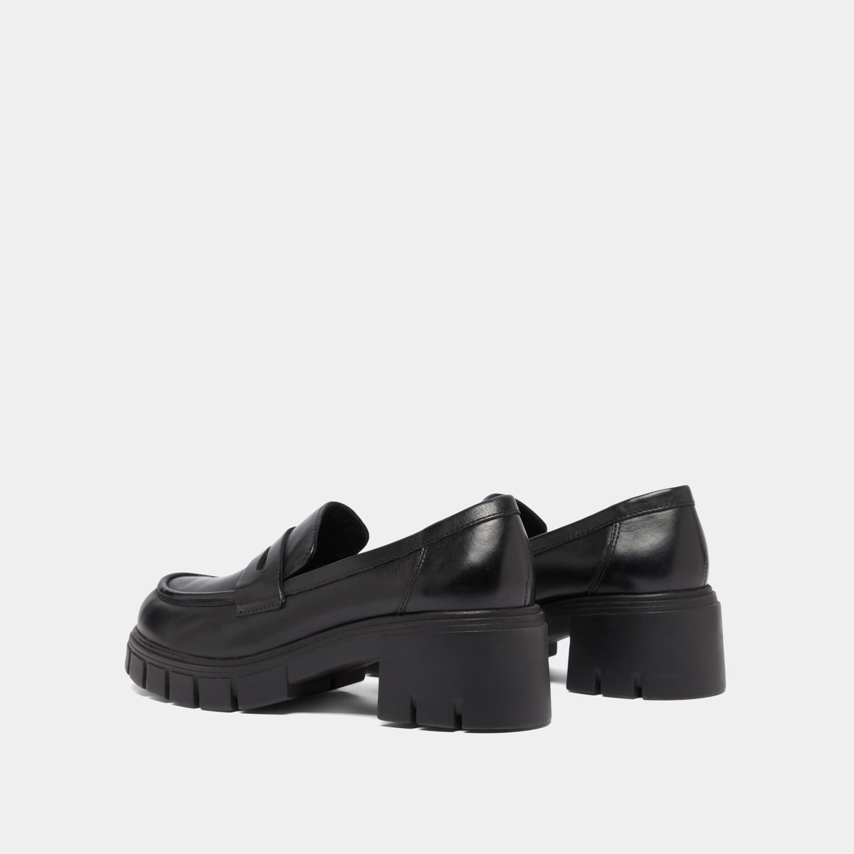 Heeled loafers with notched soles in black leather | ARON