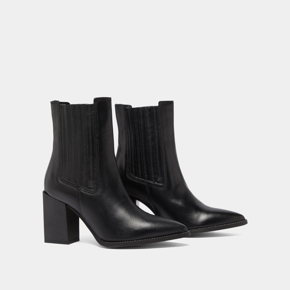 Ankle boots with heels and pointed toes in black leather | PERLINE