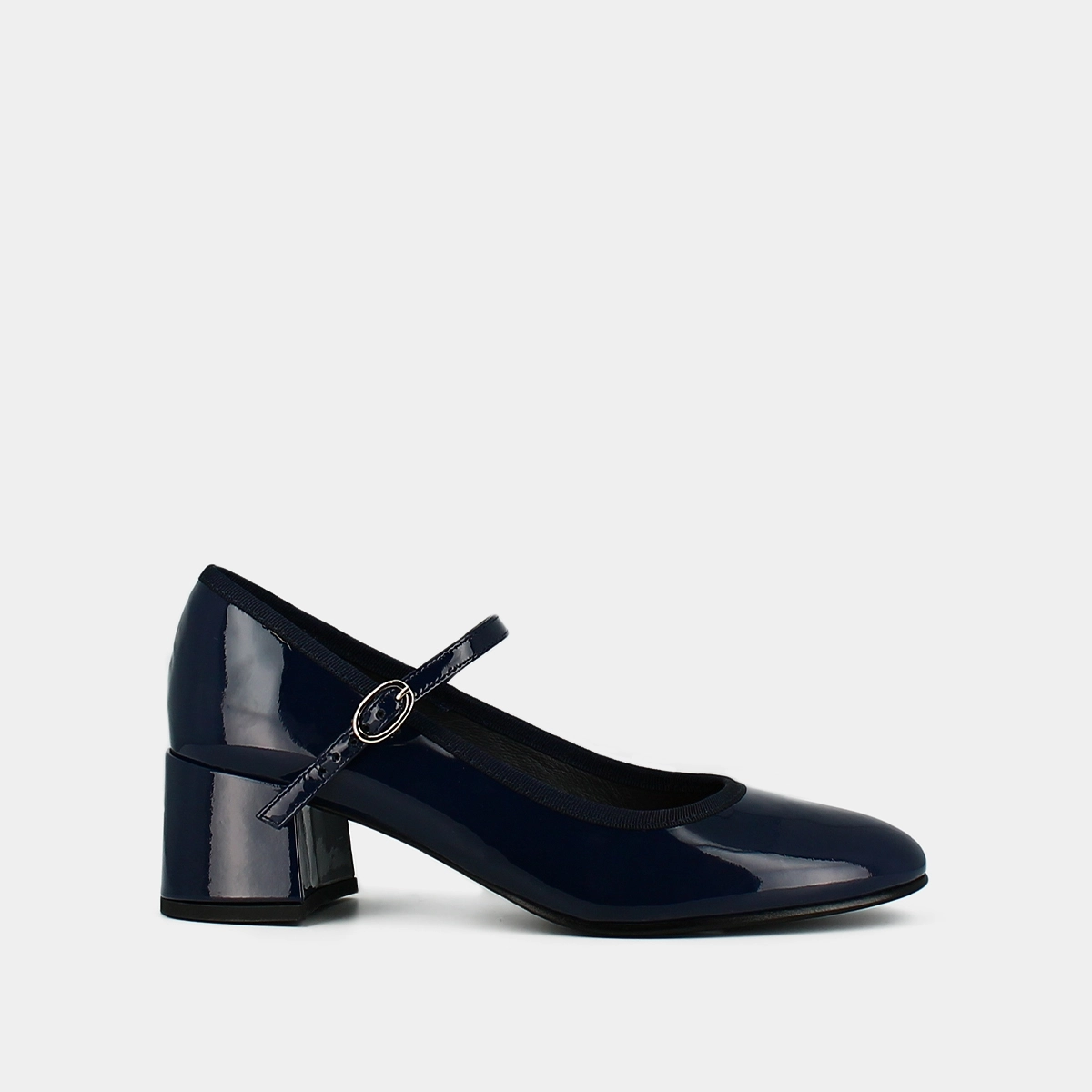 Heeled slippers in blue patent leather | DALMATIE
