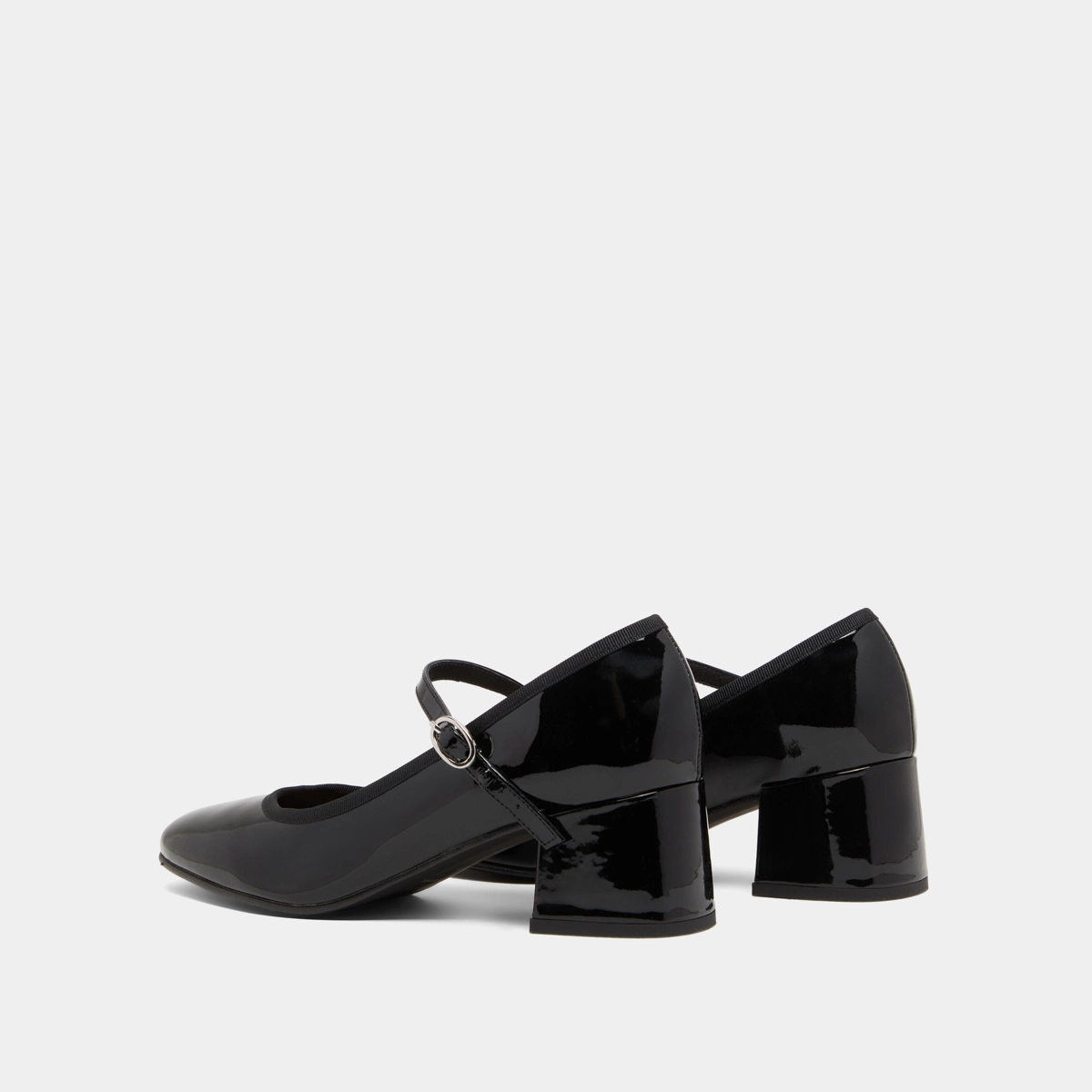 Heeled slippers in black patent leather | DALMATIE