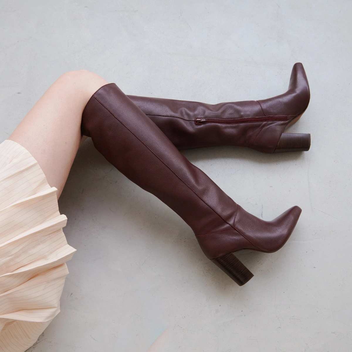 High boots with heels and pointed toes in burgundy leather | BETHANY