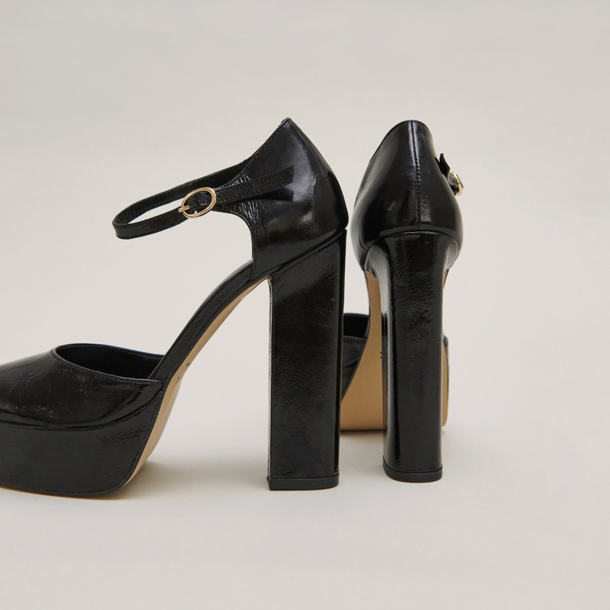 Heeled Mary Jane and platforms in black glazed leather | VANCOUVER