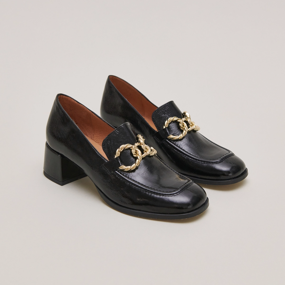 Round-toed loafers with gold buckles in black glazed leather | VINCENNES