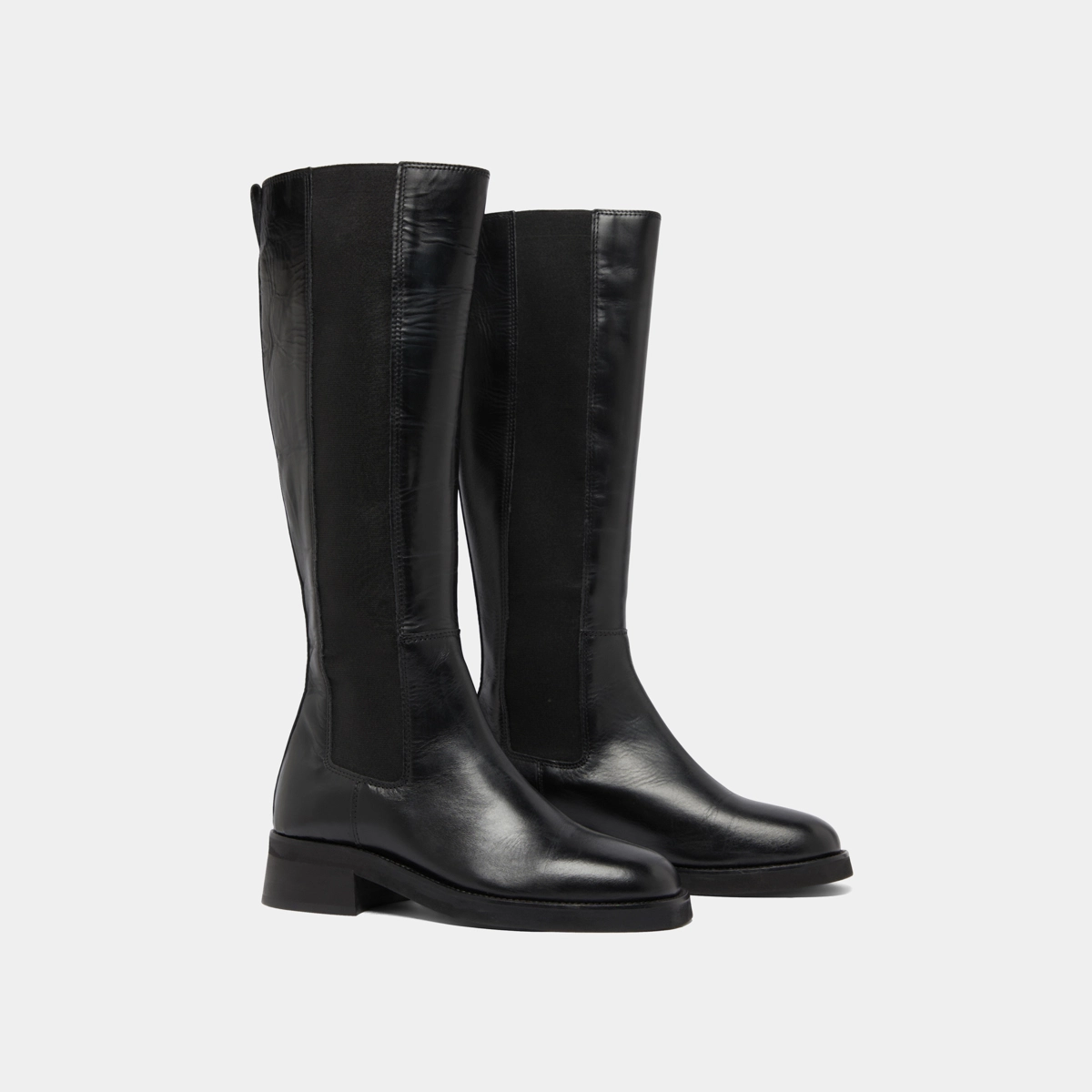 High boots in black leather | PEGGIE