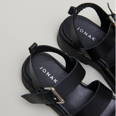 Platform sandals with buckles in black leather | priame