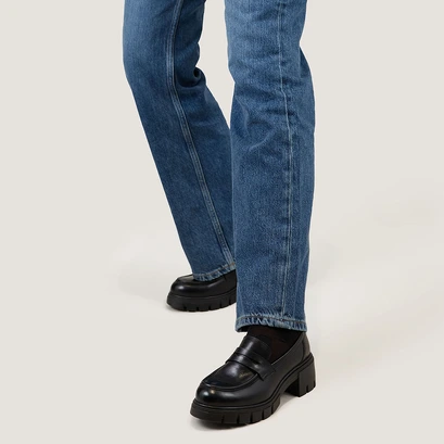 Heeled loafers with notched soles in black leather | aron