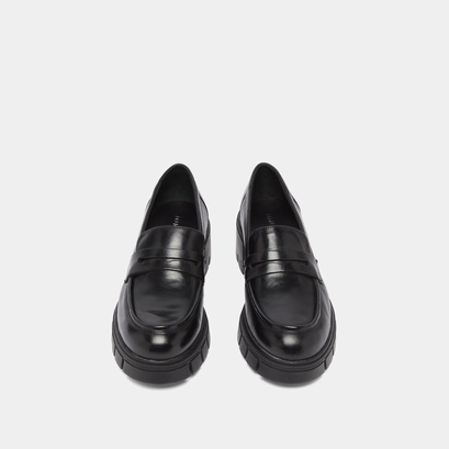 Heeled loafers with notched soles in black leather | aron