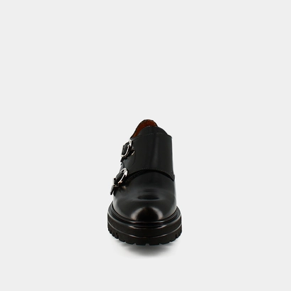 Derbies with double buckles and notched soles in black glazed leather | amsterdam