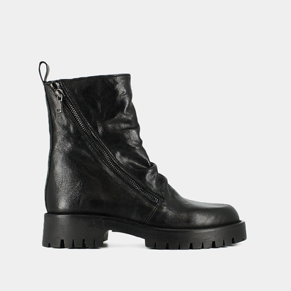 Boots with zips and notched soles in black aged leather | ROLIN