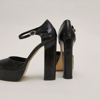 Heeled mary jane and platforms in black glazed leather | vancouver