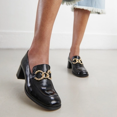 Round-toed loafers with gold buckles in black glazed leather | vincennes