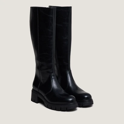 Boots with notched soles in black leather | antonin