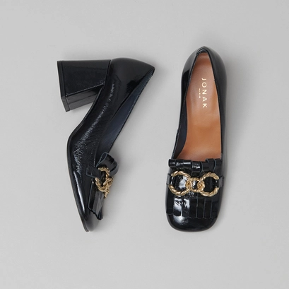Heeled loafers with gold buckles in black leather | domitille