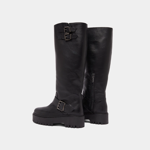 Boots with straps and notched soles in black grained leather | REINE