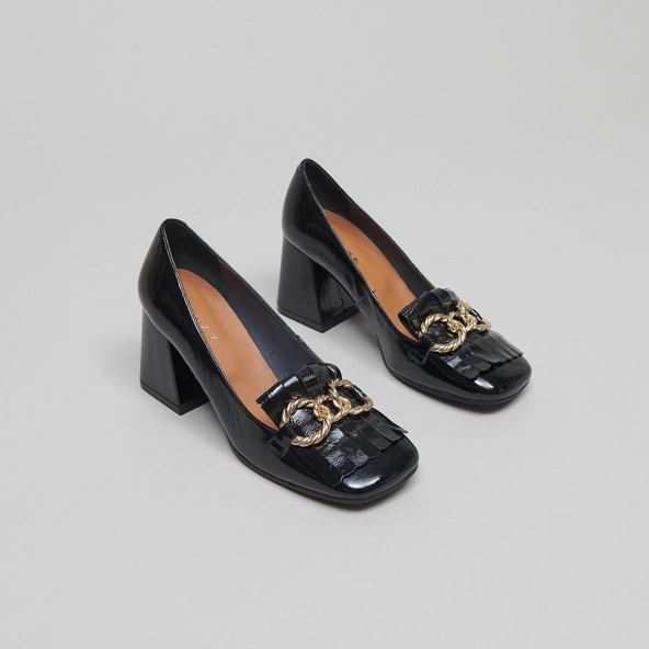 Heeled loafers with gold buckles in black leather | DOMITILLE