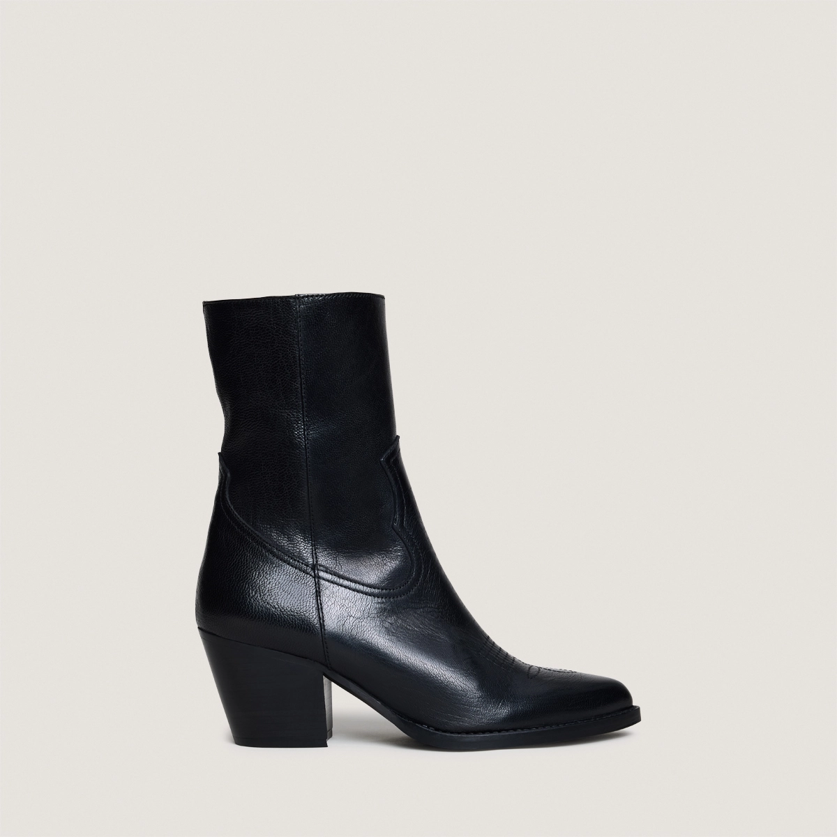 Heeled ankle boots with topstitch in black leather | DJAMENA