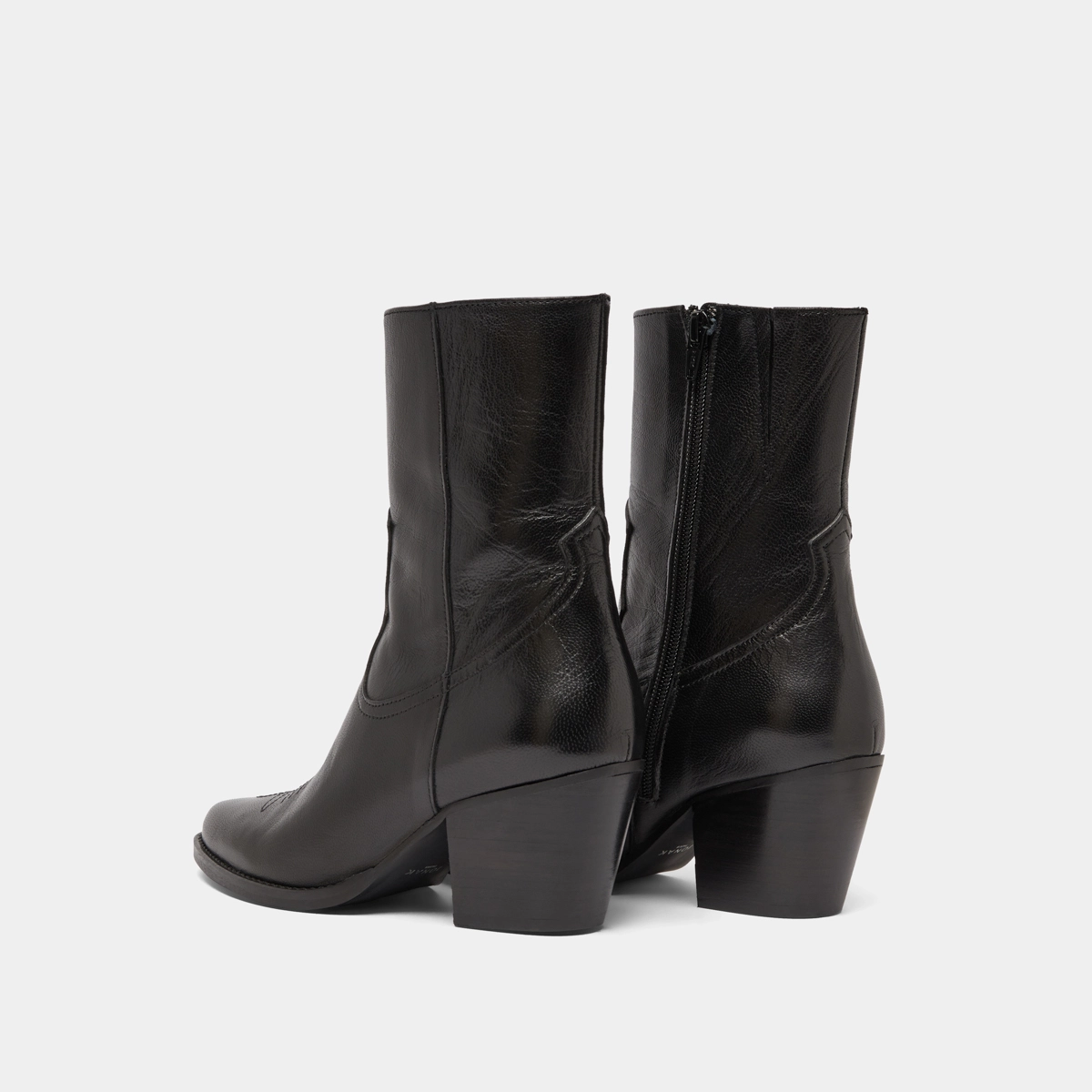 Heeled ankle boots with topstitch in black leather | DJAMENA