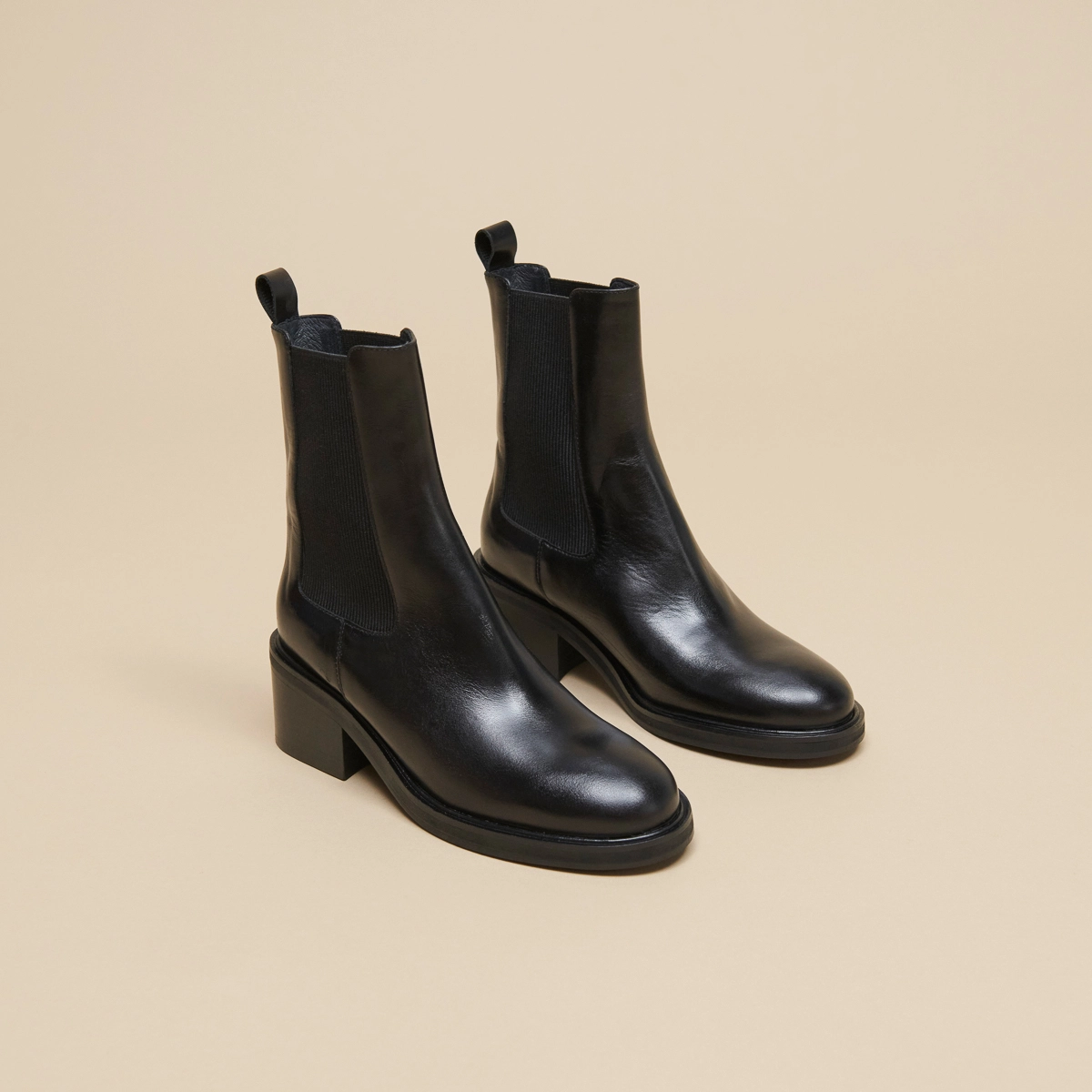 Boots with elastics in black leather | DEMOISELLE